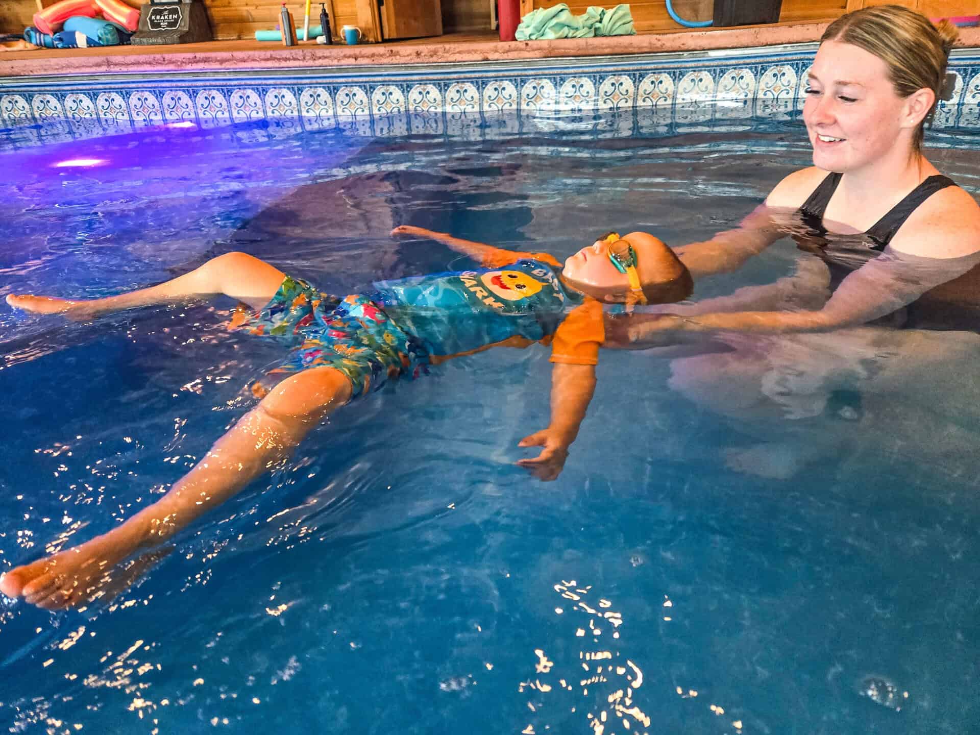 little swimmer learning to float at Barracuda Swim Club in Laurel Montana